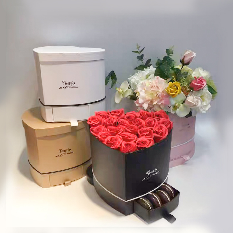 心形雙層精(jīng)品(pǐn)花盒(hé)搭配(pèi)絲(sī)帶(dài)蝴蝶結